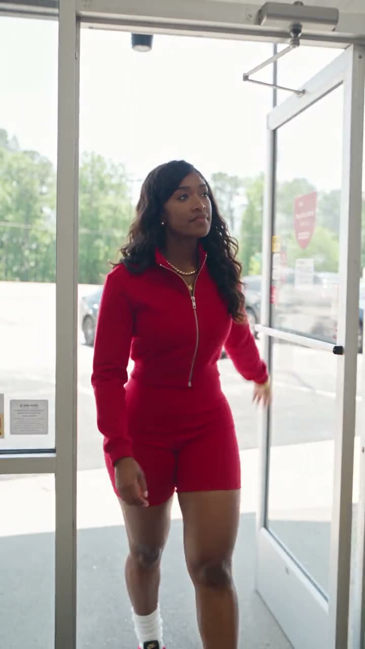 AI twin video example in a red romper